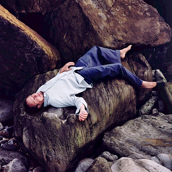 hiryczuk_van_oevelen_man_laying_on_a_rock_2007_1.jpg